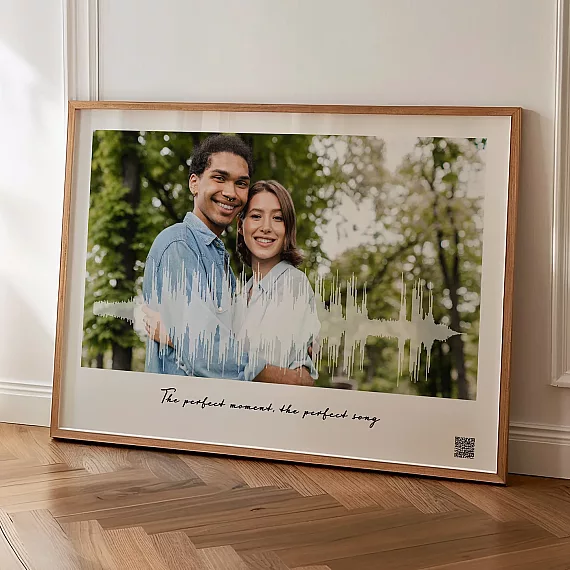 framed soundwave art with couple photo and waveform design displayed in home interior
