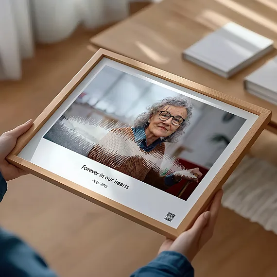 memorial voice recording print with soundwave held by person in hands
