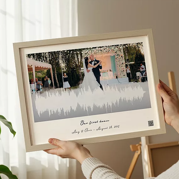 first dance song soundwave art wedding kiss framed print held by woman