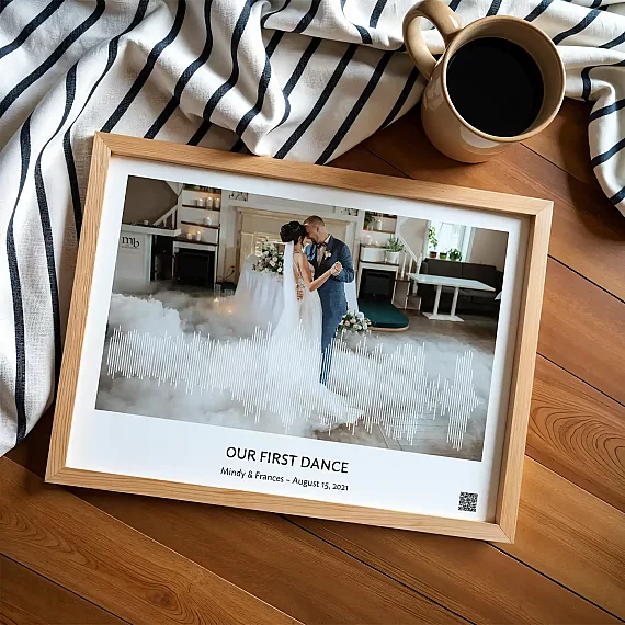 first dance song soundwave art framed wedding print on wooden table with coffee