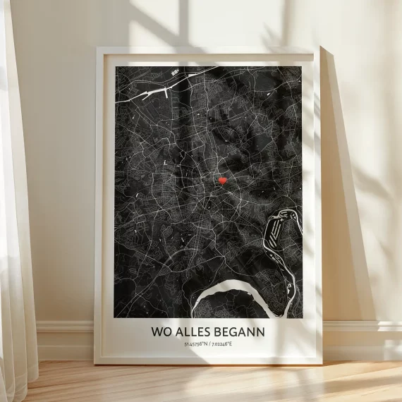 Framed black Where It All Began personalized map with a red heart marking a meaningful location.