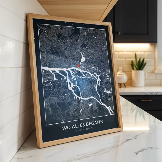 Framed Where It All Began personalized map with a dark color theme displayed on a kitchen countertop.