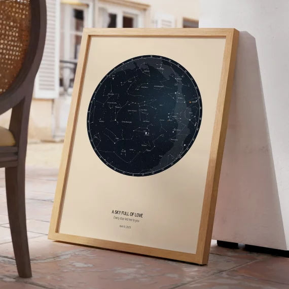 Round personalized star map poster for wedding day in wooden frame with constellation design.