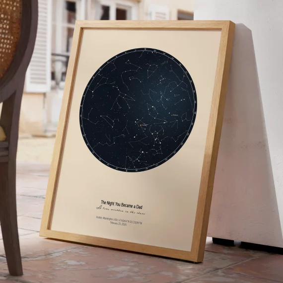 Minimalist The Day You Became My Daddy star map print leaning against a wall in a bright interior.
