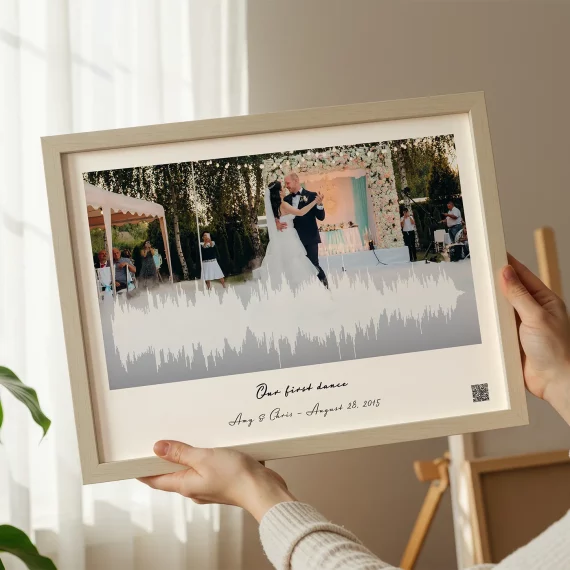 first dance song soundwave art wedding kiss framed print held by woman