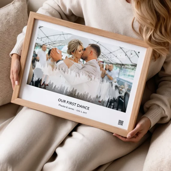 first dance song soundwave art wedding kiss framed print held by woman