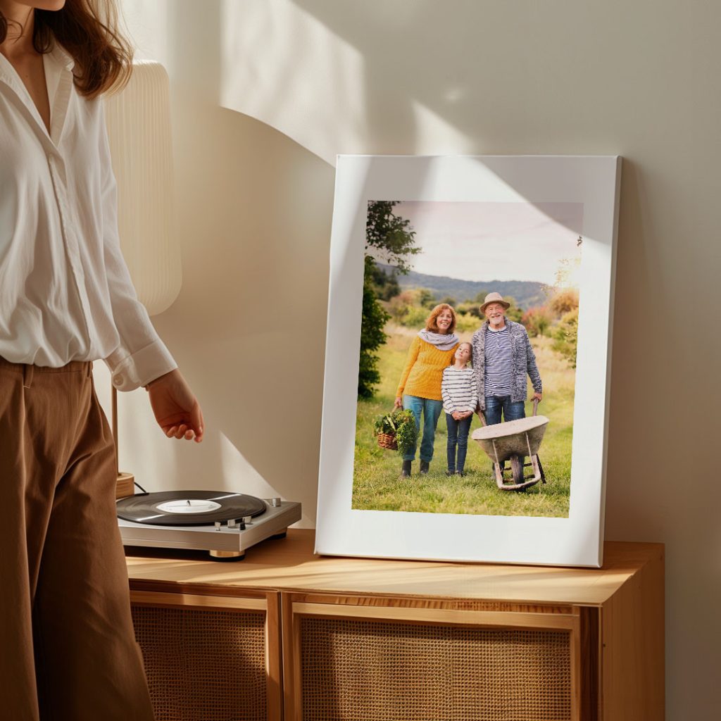 Personalized family photo canvas print displayed on a modern cabinet as meaningful home décor.