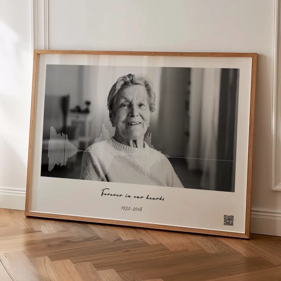 memorial voice recording wall art with elderly woman portrait and soundwave displayed on floor