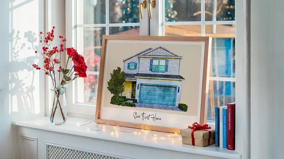 Personalized watercolor house portrait Christmas gift framed on mantle with fairy lights and holiday decor