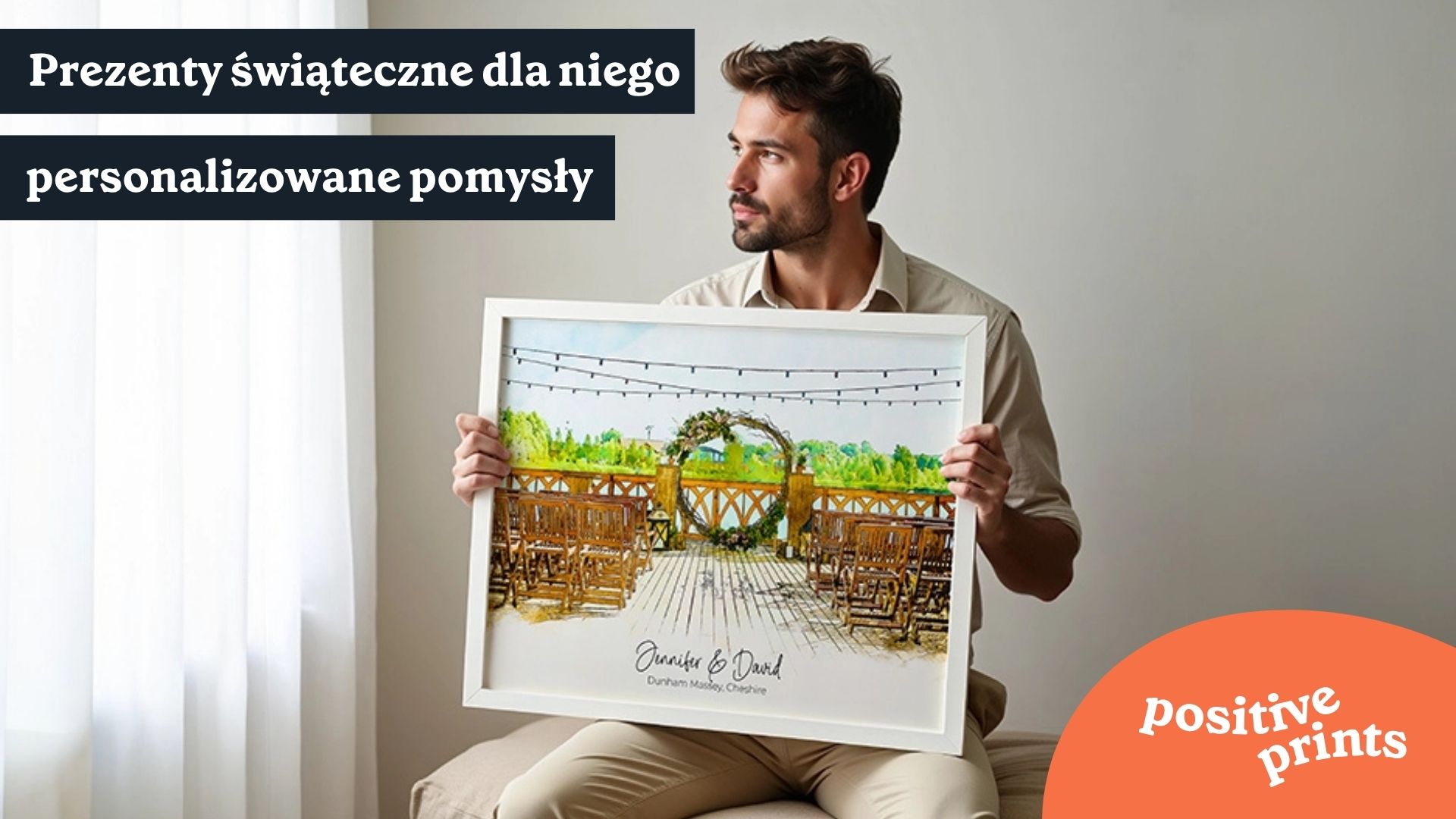Mężczyzna trzymający personalizowany obraz przedstawiający miejsce ceremonii ślubnej.