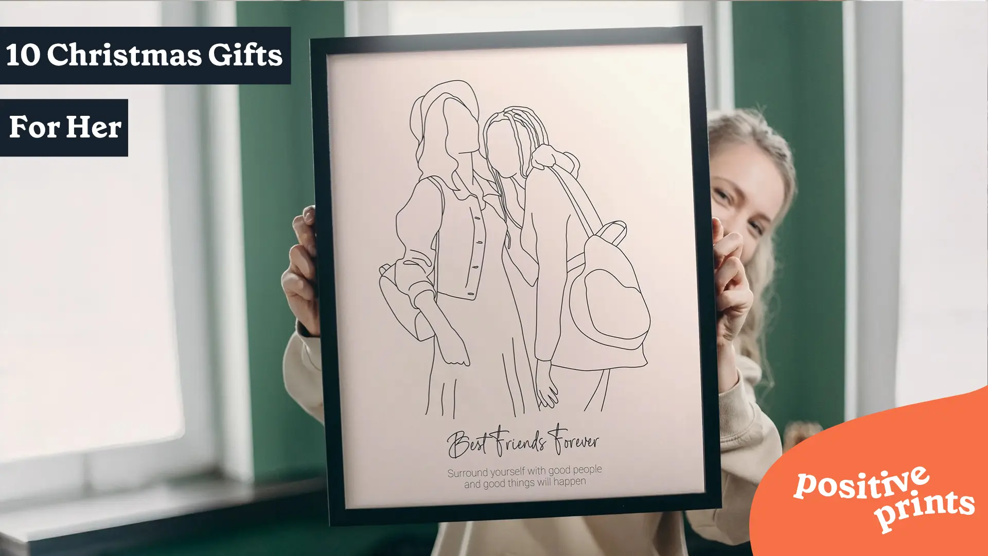 Woman holding a personalized Friends Line Art portrait, featured as a thoughtful Christmas gift for her or a best friend.